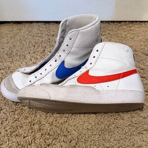 Nike White High-Top Sneakers with Blue and Red Swooshes